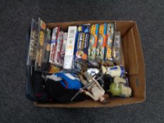 A box of assorted Star Wars toys, figures, jigsaws,