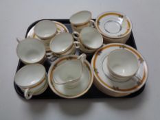 A tray containing approximately 37 pieces of antique Crescent tea china.