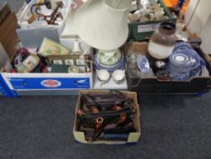 Three boxes containing assorted china to include table lamp with shades,
