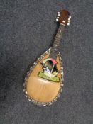 A bowl back mother of pearl inlaid mandolin
