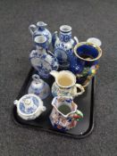 A tray containing assorted china to include Delft vases, Mason's regency jug,