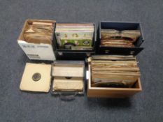 Four cases and a box containing vinyl 78's.