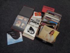 Two boxes containing Nana Mouskouri LPs, some signed,