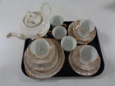A tray containing 19 pieces of white and gilt tea china together with a further Victorian china