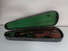 An early twentieth century violin and bow in coffin case CONDITION REPORT: Back 14