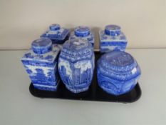 A tray of six assorted Ringtons blue and white caddies