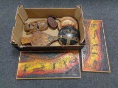A box of tribal wall masks, bellows,
