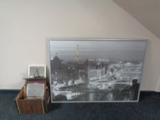 A large framed print of a Parisian skyline together with a box of antique and later mirrors and