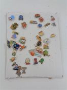 A quantity of twentieth century French enamel pin badges