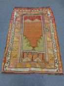 A Iranian prayer rug,