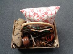 A box of wooden finials, curtain rings, cushion,