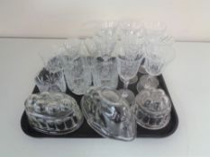 A tray of assorted drinking glasses,