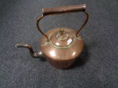A Victorian brass and copper kettle
