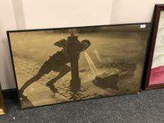A Continental print of a boy by a fire hydrant, signed Jacobsen, 98 cm x 61 cm, framed.