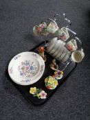A 20th century Midwinter 12 piece tea service on chrome stand,