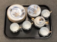 Sixteen pieces of 20'th Century Japanese tea china, gilt-rimmed with 