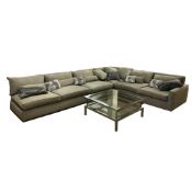 A high quality contemporary L-shaped lounge settee, in champagne-silver upholstery,