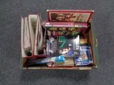 A box containing scrabble, British Regiment badge set, Great British Locomotive magazine in folders,