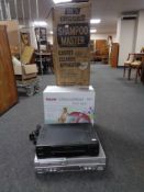 A Sanyo DVD video cassette recorder together with a Matsui VCR,