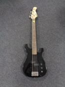 A Harley Benton electric bass guitar.