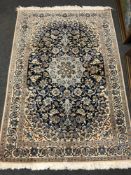 A fine Persian Nain rug,