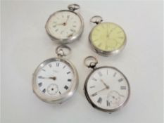 Four silver pocket watches - Waltham USA and three others.