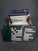 A box containing albums containing 20th century world stamps, loose stamps, smiler sheet.