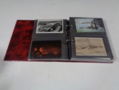 An album of antiquarian and later naval postcards depicting ships, sailors and barracks,