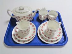 A nine piece Susie Cooper Apple Gay tea for two.