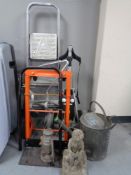 A golf trolley together with a sack barrow, a set of aluminum steps, an aluminium stand off bracket,