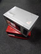 An LG microwave together with two others