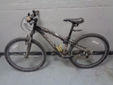 A Specialised Hardrock front suspension mountain bike.