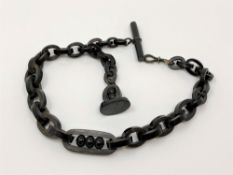 A Victorian vulcanite Albert chain with T-bar,