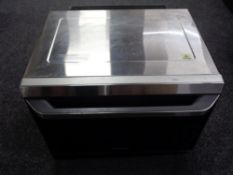 A Panasonic stainless steel table oven.