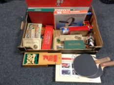 A box of assorted board games, boxwood chess set, draughts,