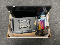 A box of an LCD TV, new DVD's,