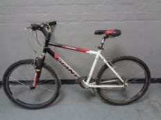 A Giant Boulder Shock front suspension mountain bike.