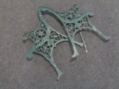 A pair of cast iron bench ends
