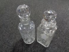 An Edinburgh Crystal whisky decanter together with a further crystal decanter.