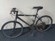 A Carrera Valour 27.5 front suspension mountain bike.
