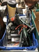 A crate containing fishing equipment to include landing net, rod stands, lures, hooks etc.