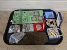 A tray of foreign coins, crowns, plated Deco tea spoons,
