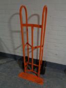 A heavy duty twin handled sack barrow with spring axle