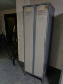 A pair of metal gym lockers
