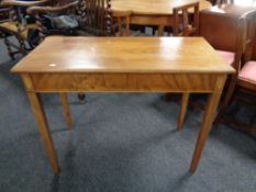 A late nineteenth century inlaid mahogany occasional table