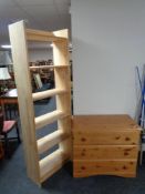 A pine three drawer chest together with a pine open bookshelf