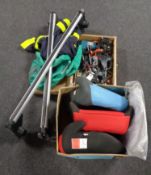 A wooden box containing router attachments, dove tailer,