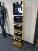 A Dior perfume display stand.