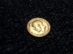 A George V full gold sovereign 1928