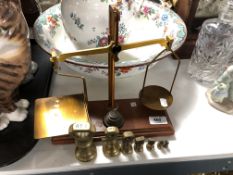 A set of Arnold Precision scales with weights together with a further set of seven graduated brass